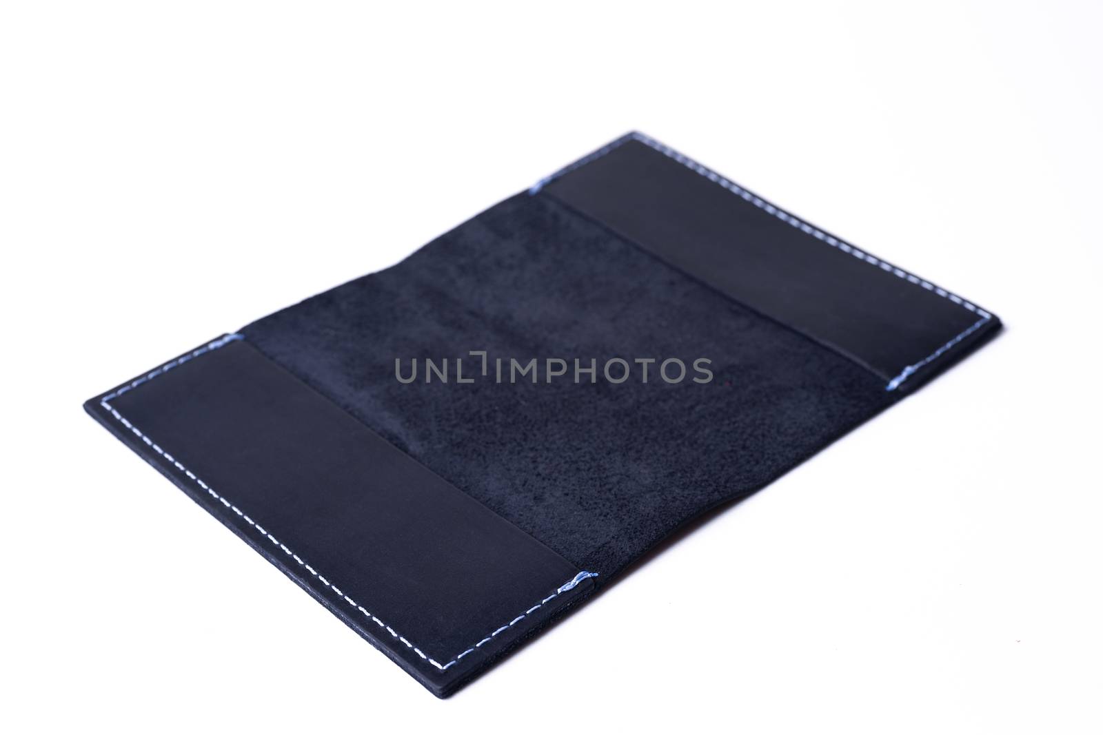 Blue handmade leather passport cover isolated on white background. Cover is open. Stock photo of luxury businessman accessories.