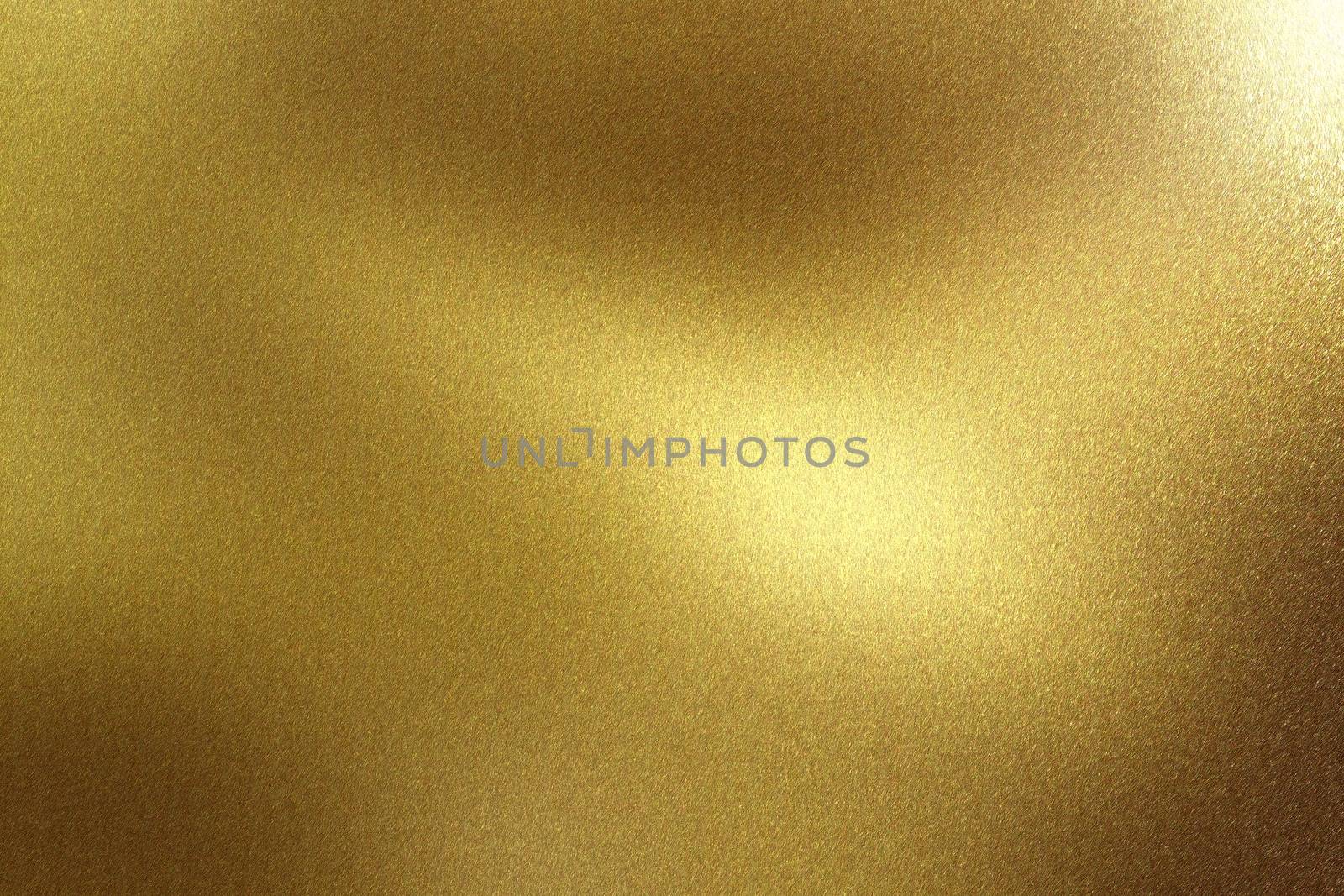 Glowing brushed gold metal wall surface, abstract texture background