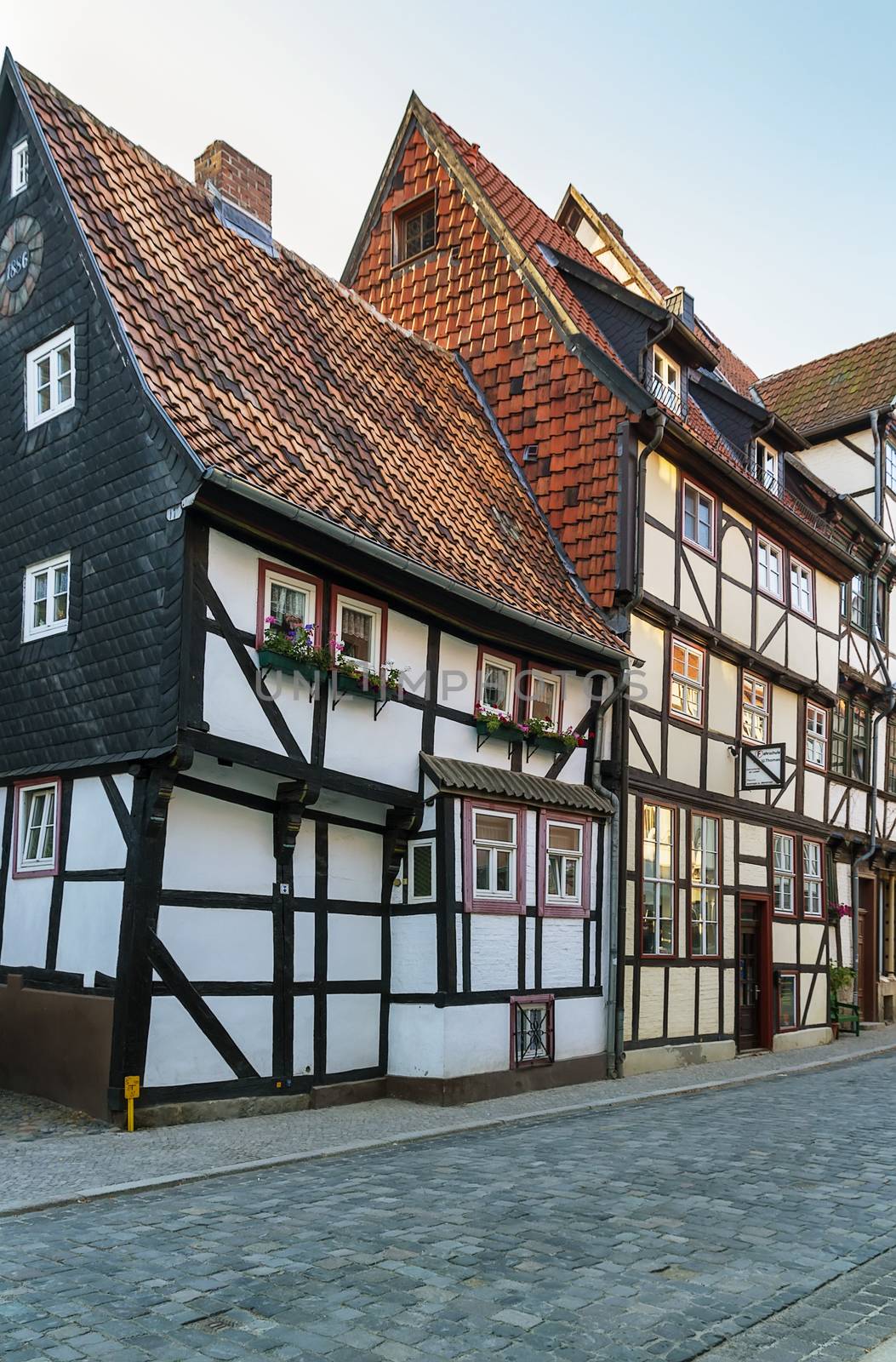 the street with half-timbered houses in Quedlinburg, Germany. In downtown a wide selection of half-timbered buildings from at least five different centuries are to be found