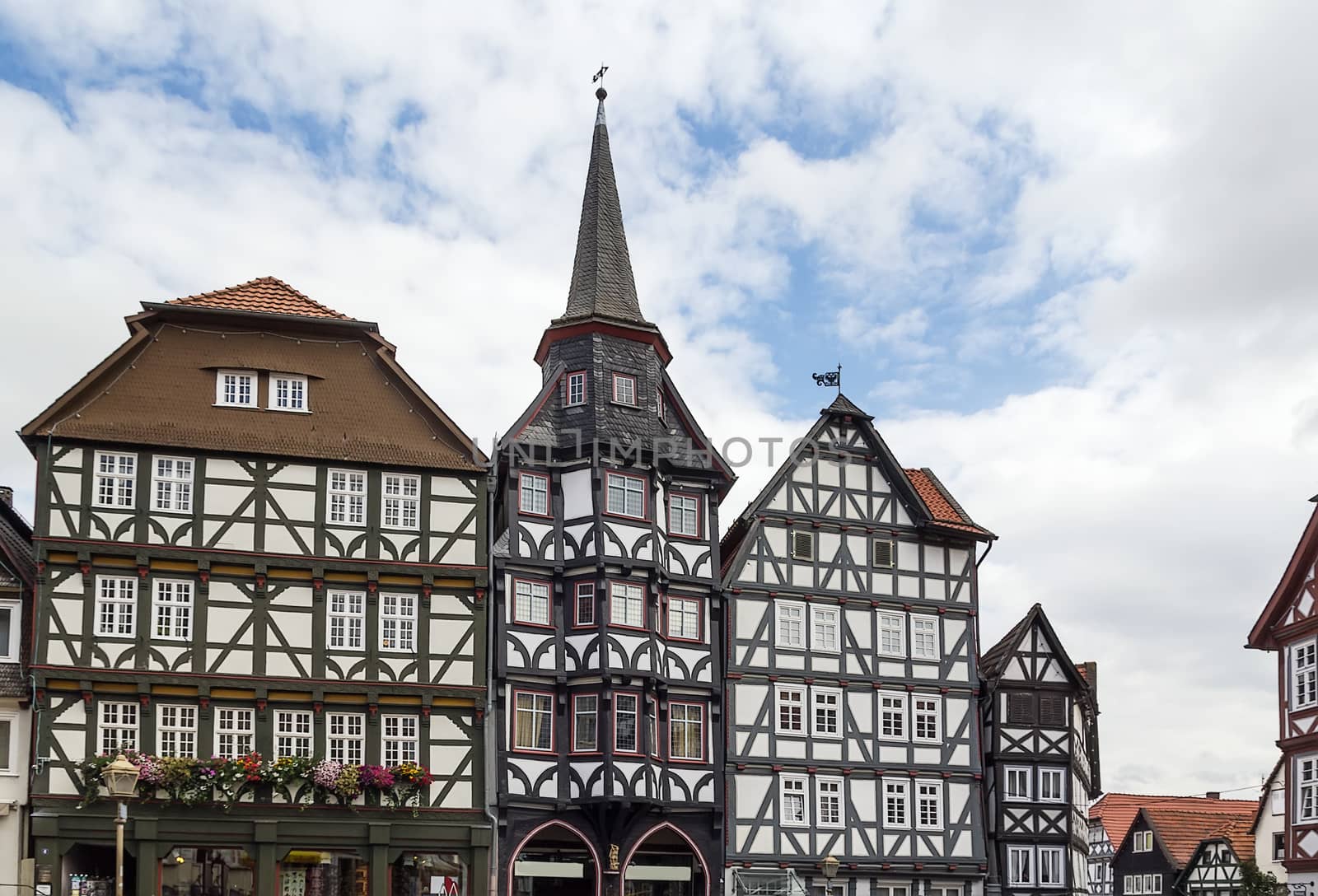 the street with picturesque ancient half-timbered houses in the Fritzlar city, Germany