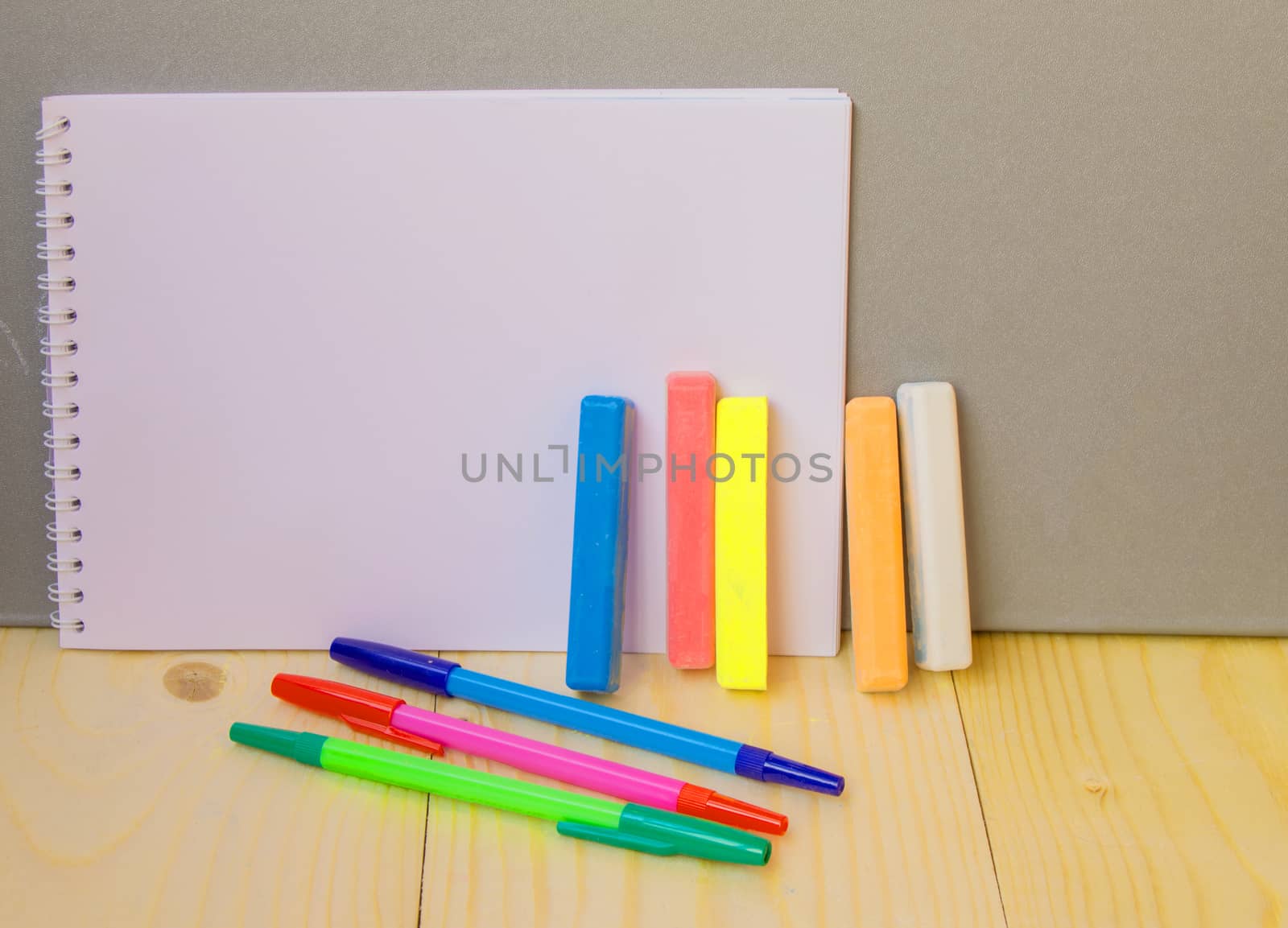 back to school concept, a pen, Notepad chalk