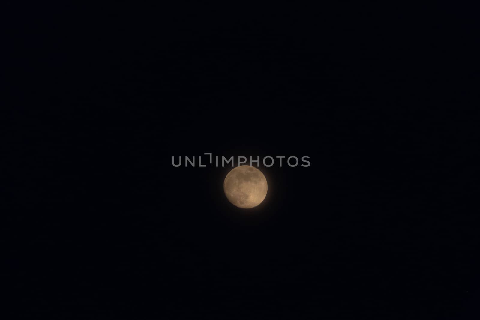 Full moon isolated on a black sky