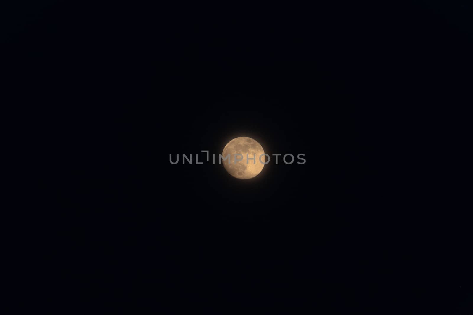 Full moon isolated on a black sky