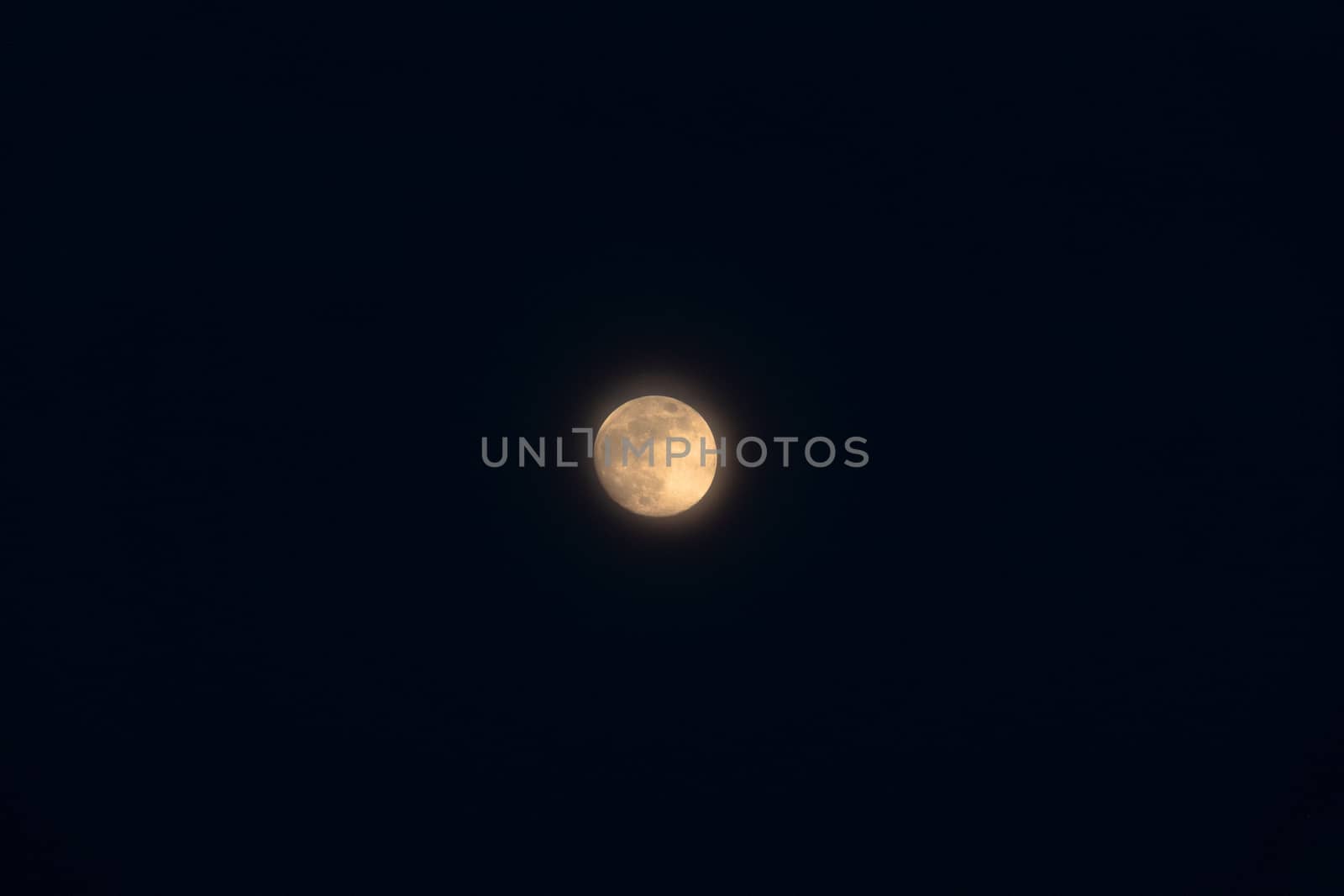 Full moon isolated on a black sky