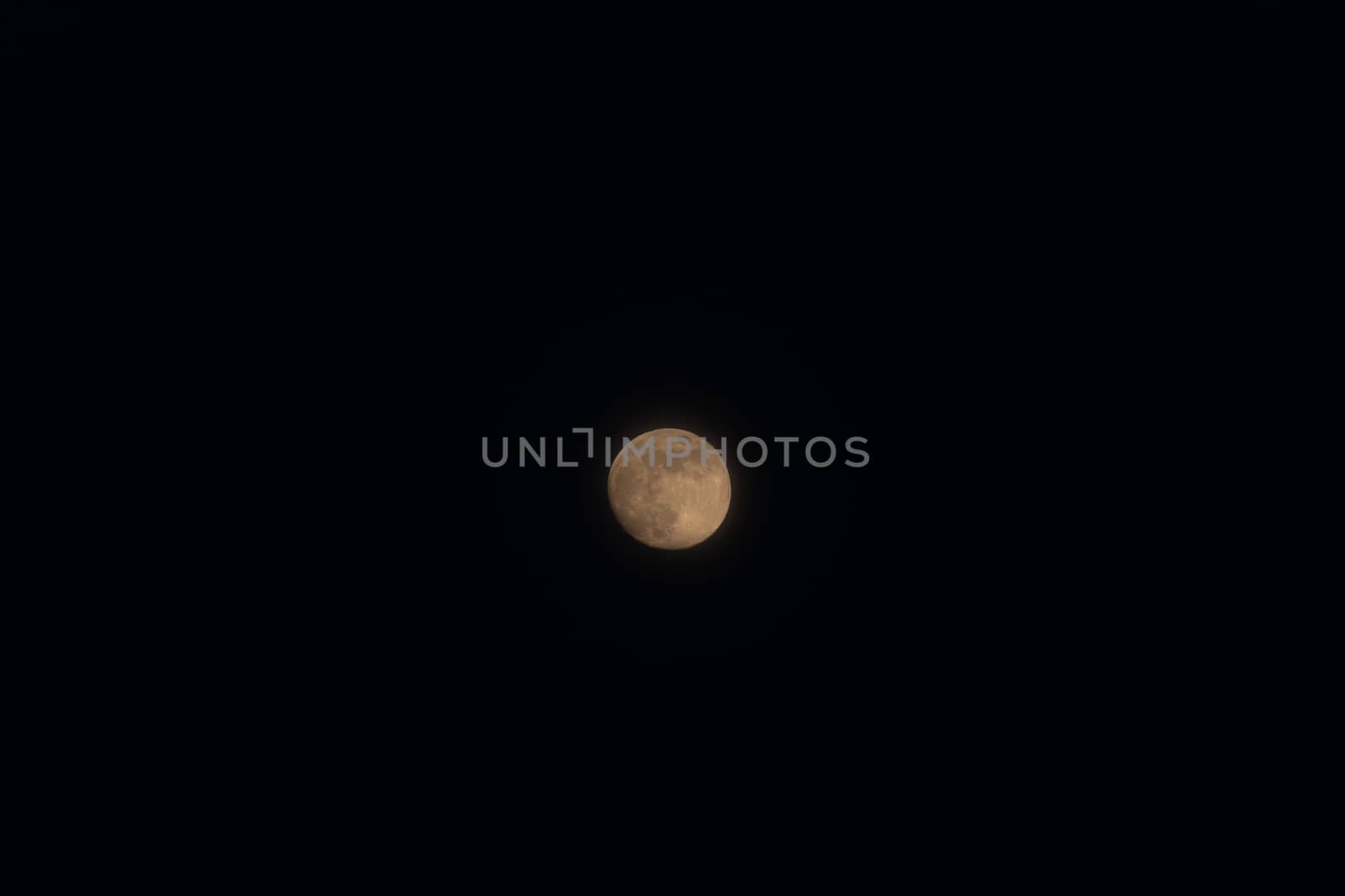 Full moon isolated on a black sky