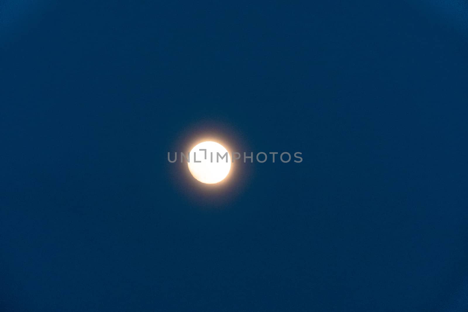 Full moon isolated on a black sky