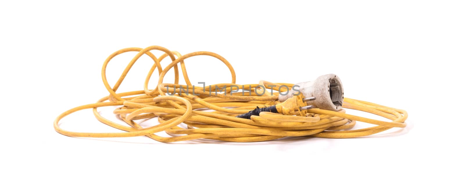 Extension cord, old and probably not safe anymore - Isolated on white