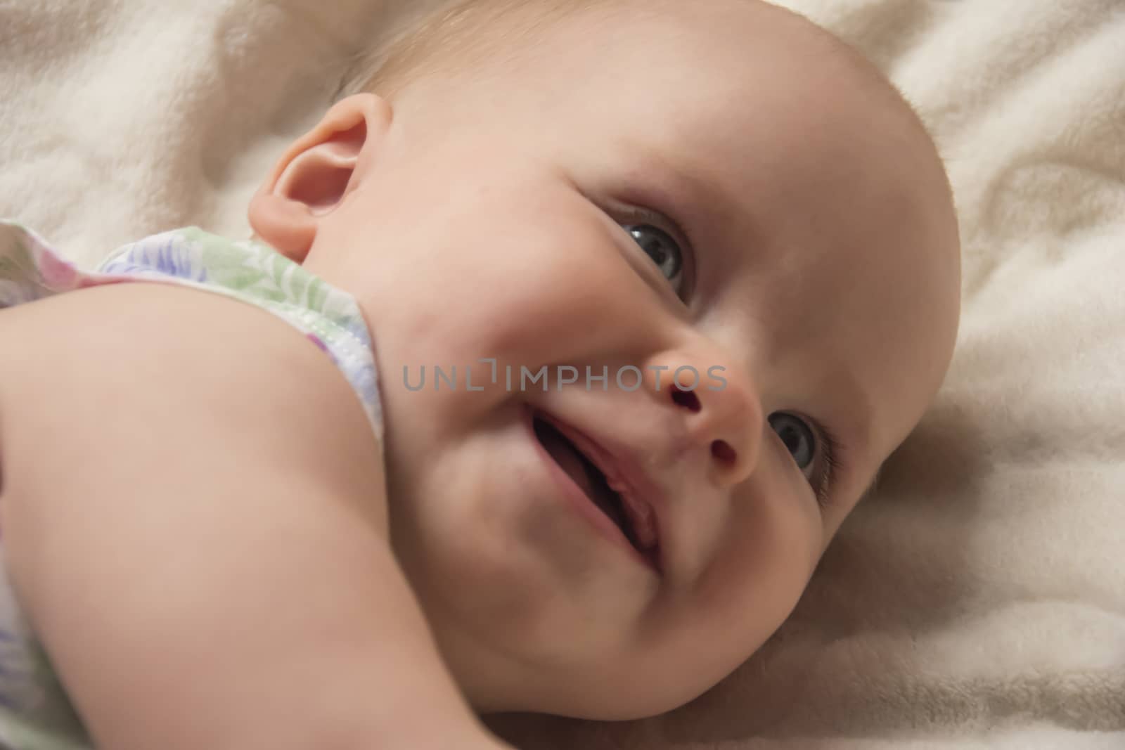 happy newborn, baby smiling close-up portrait photo. Beautiful picture, background, wallpaper 
