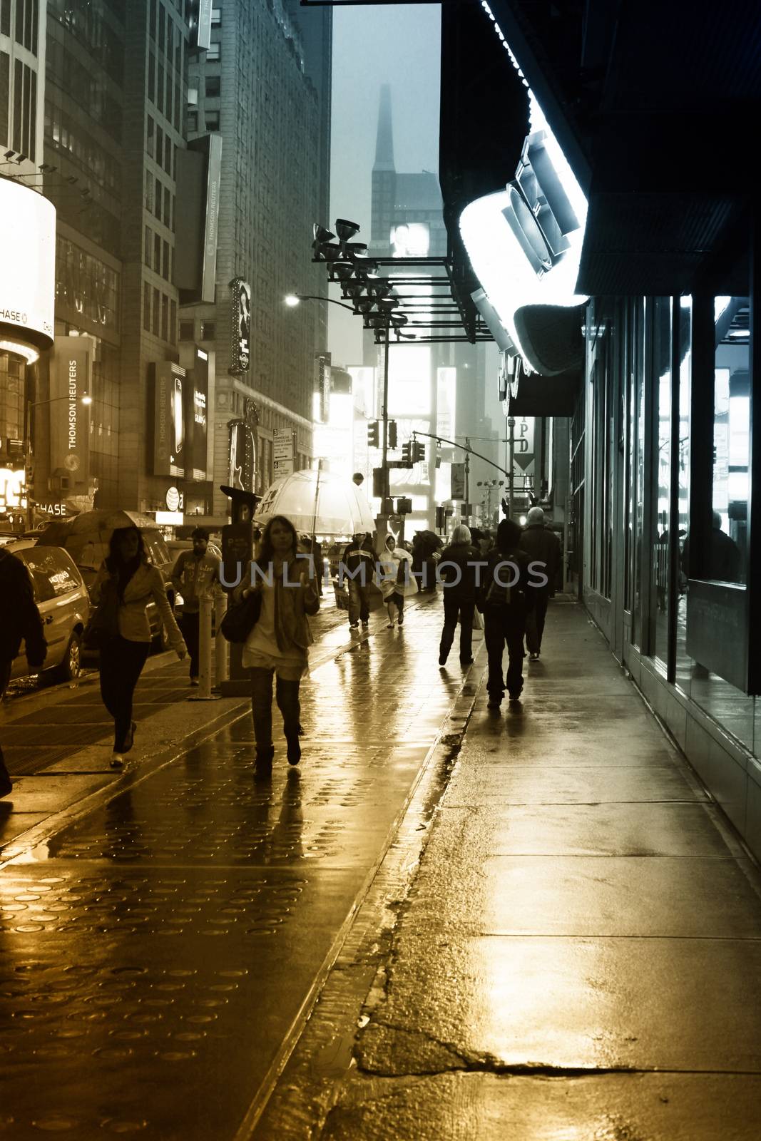 Time Square at night in the rain by friday