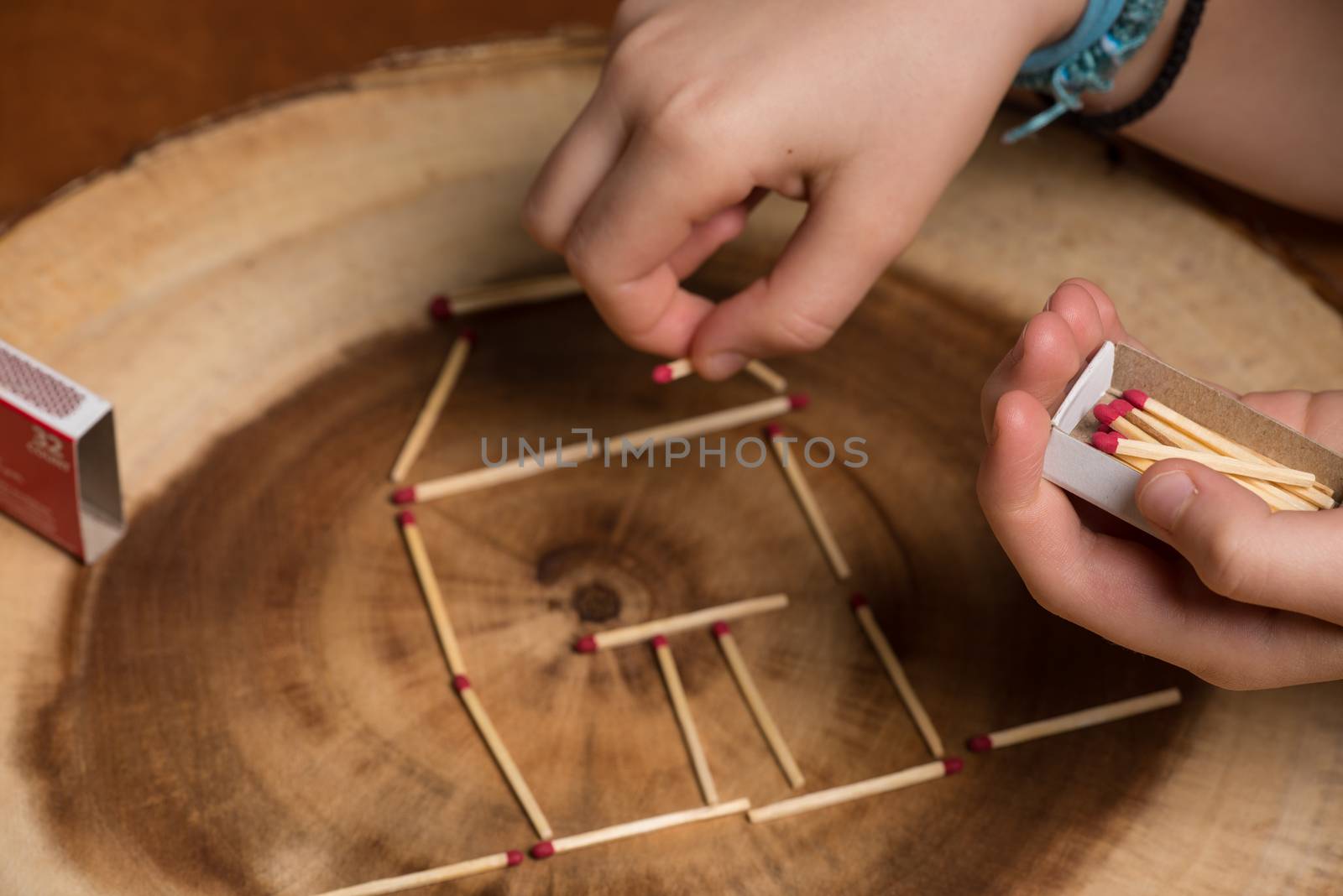 Child playing with matches.