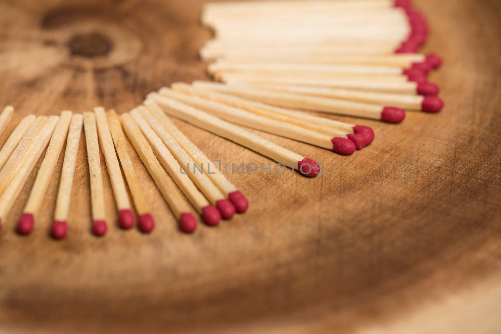 Matches on wooden table background with copy space.