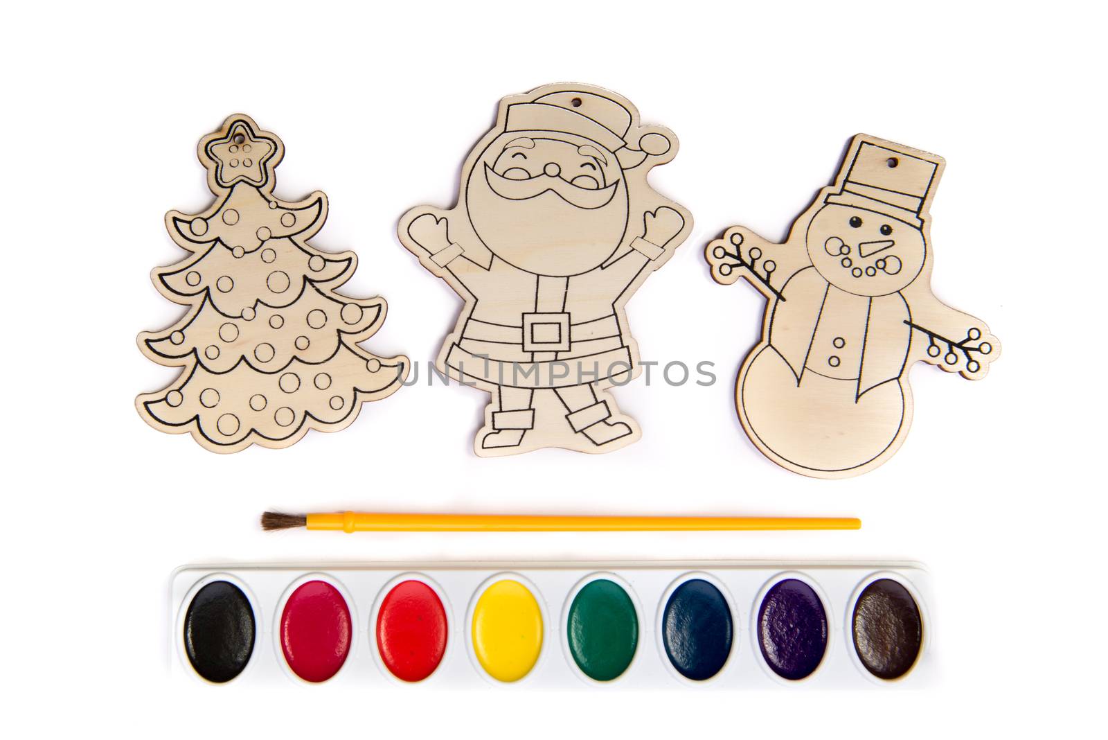 Wood craft shapes or wooden cutouts including Santa, Christmas Tree, and Snowman with paint brush and watercolor set.