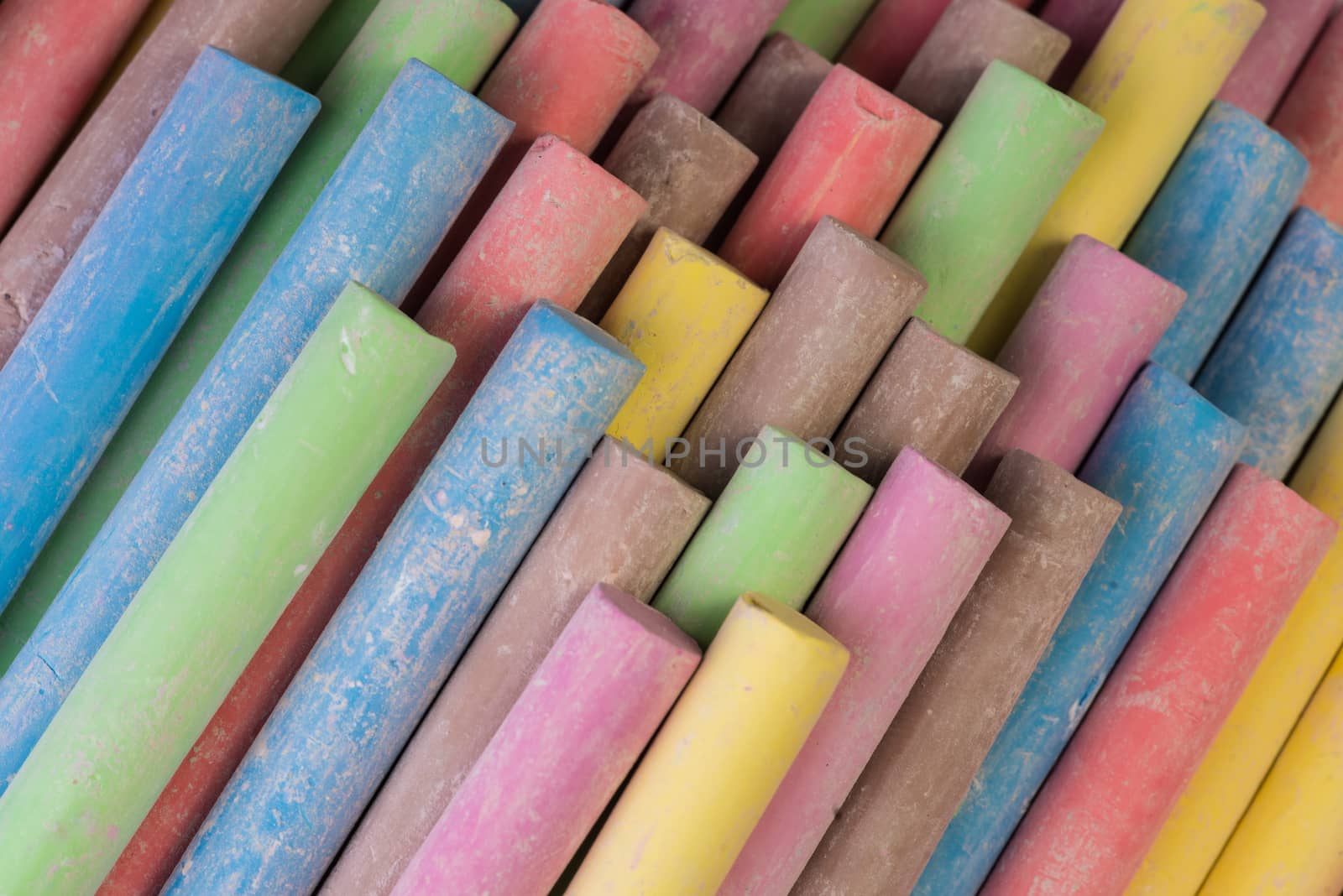 Set of dustless colored chalk background.