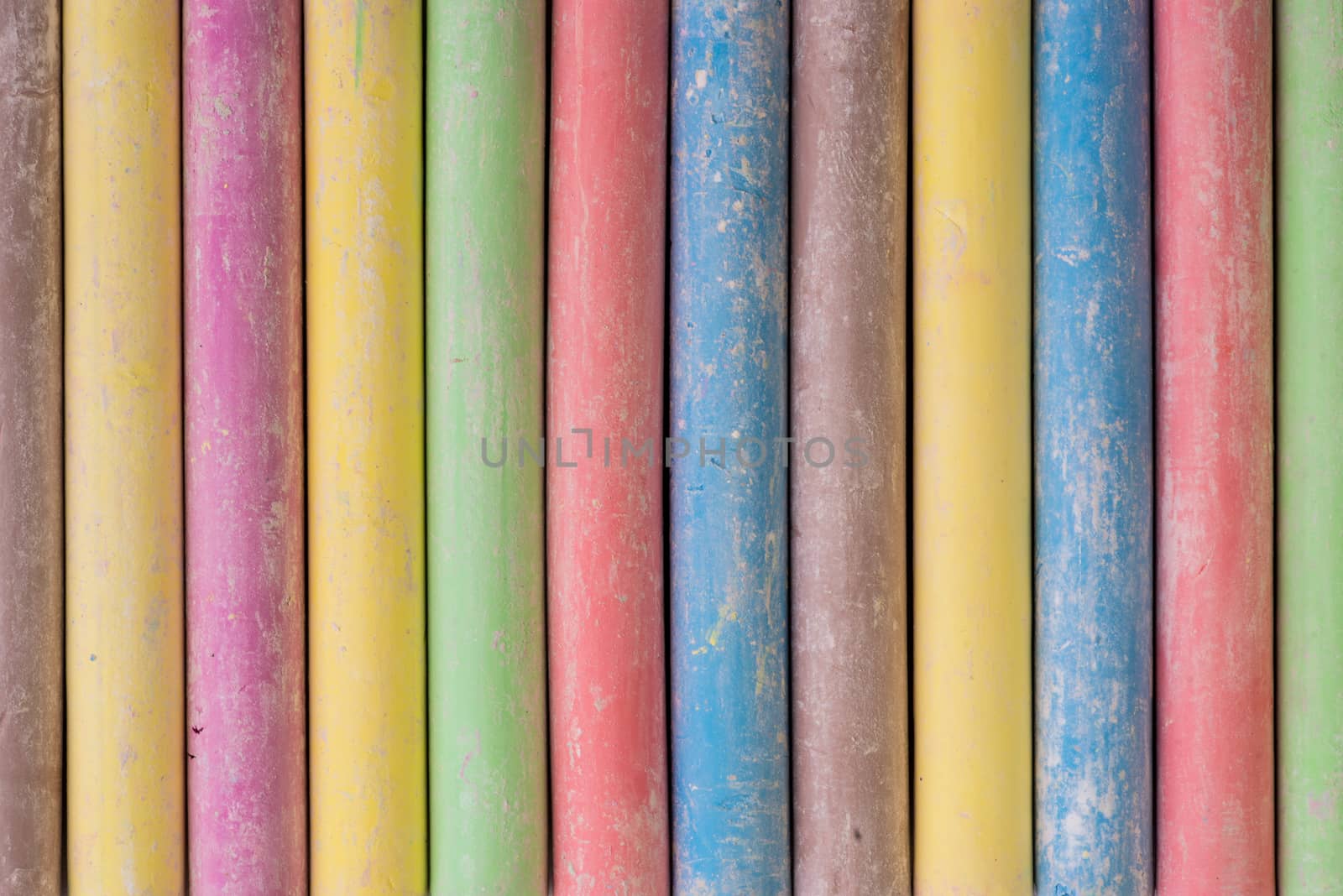 Set of dustless colored chalk background.