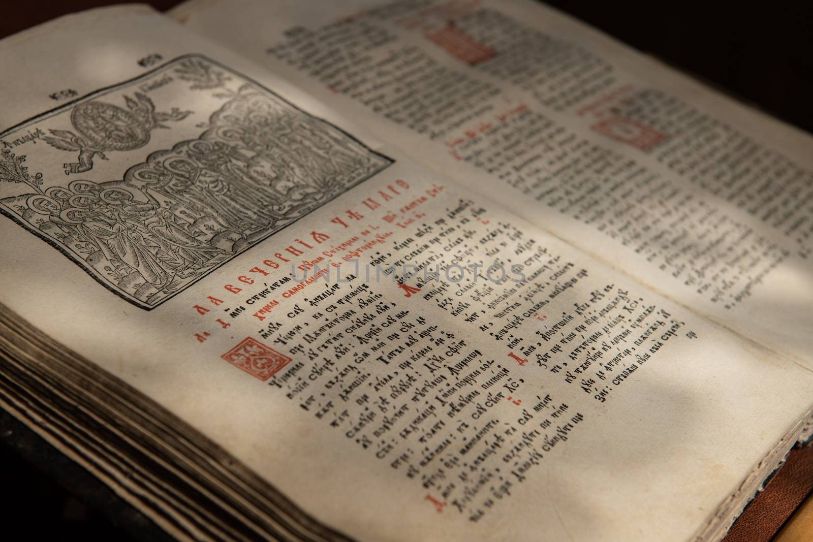 Close up of old Christian manuscript written in Cyrillic on church pulpit.