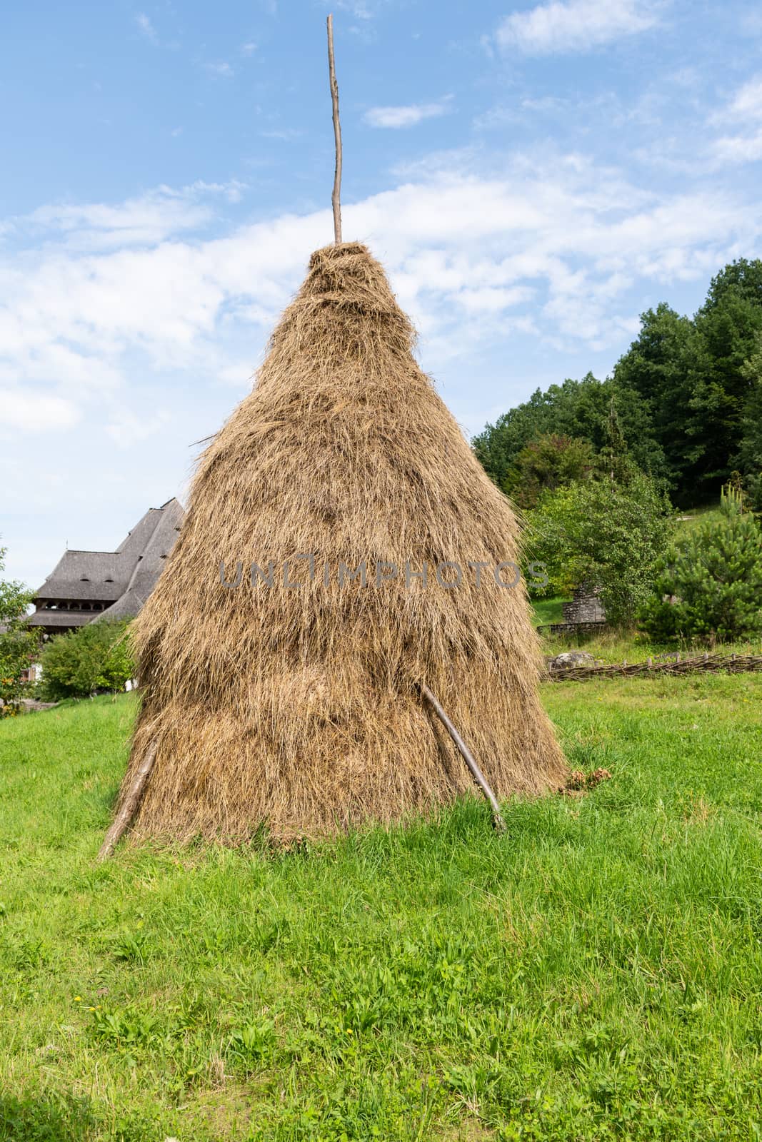 Traditional Hay Pile at Barsana Monastery (Maramures, Romania).