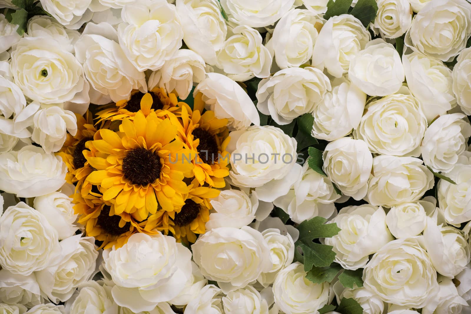 Reusable artificial flowers made from cloth and plastic.