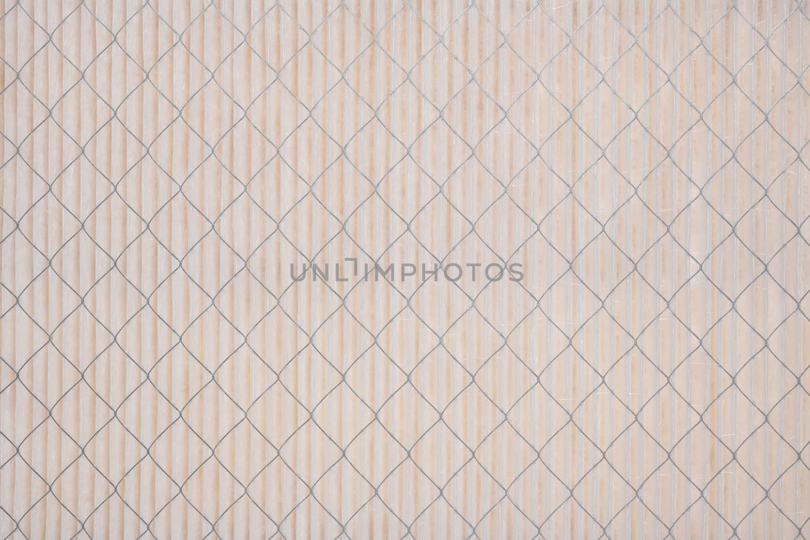 Close up pattern of a clean air furnace or air conditioning filter.