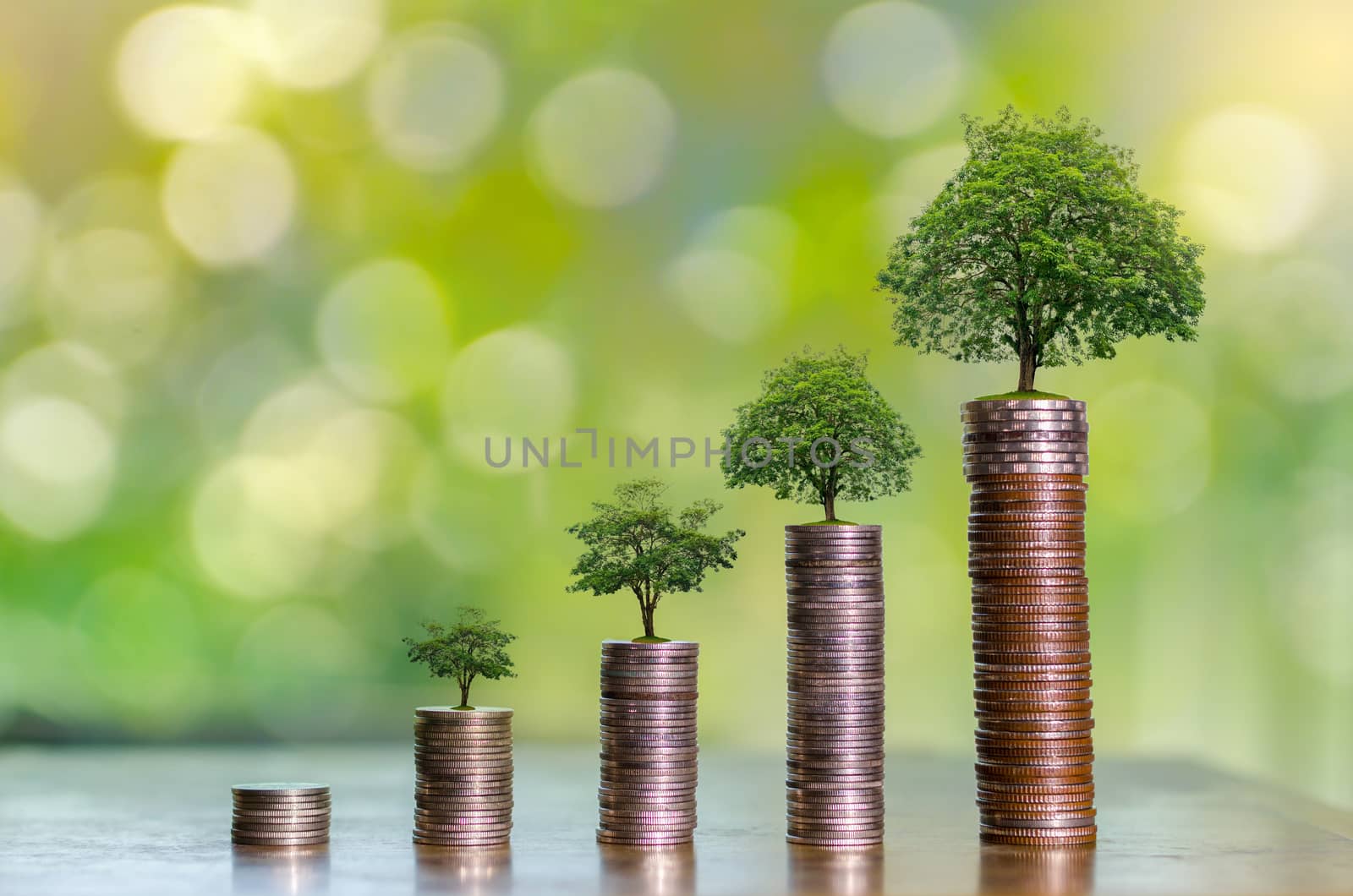 Money growth Saving money. Upper tree coins to shown concept of growing business by sarayut_thaneerat