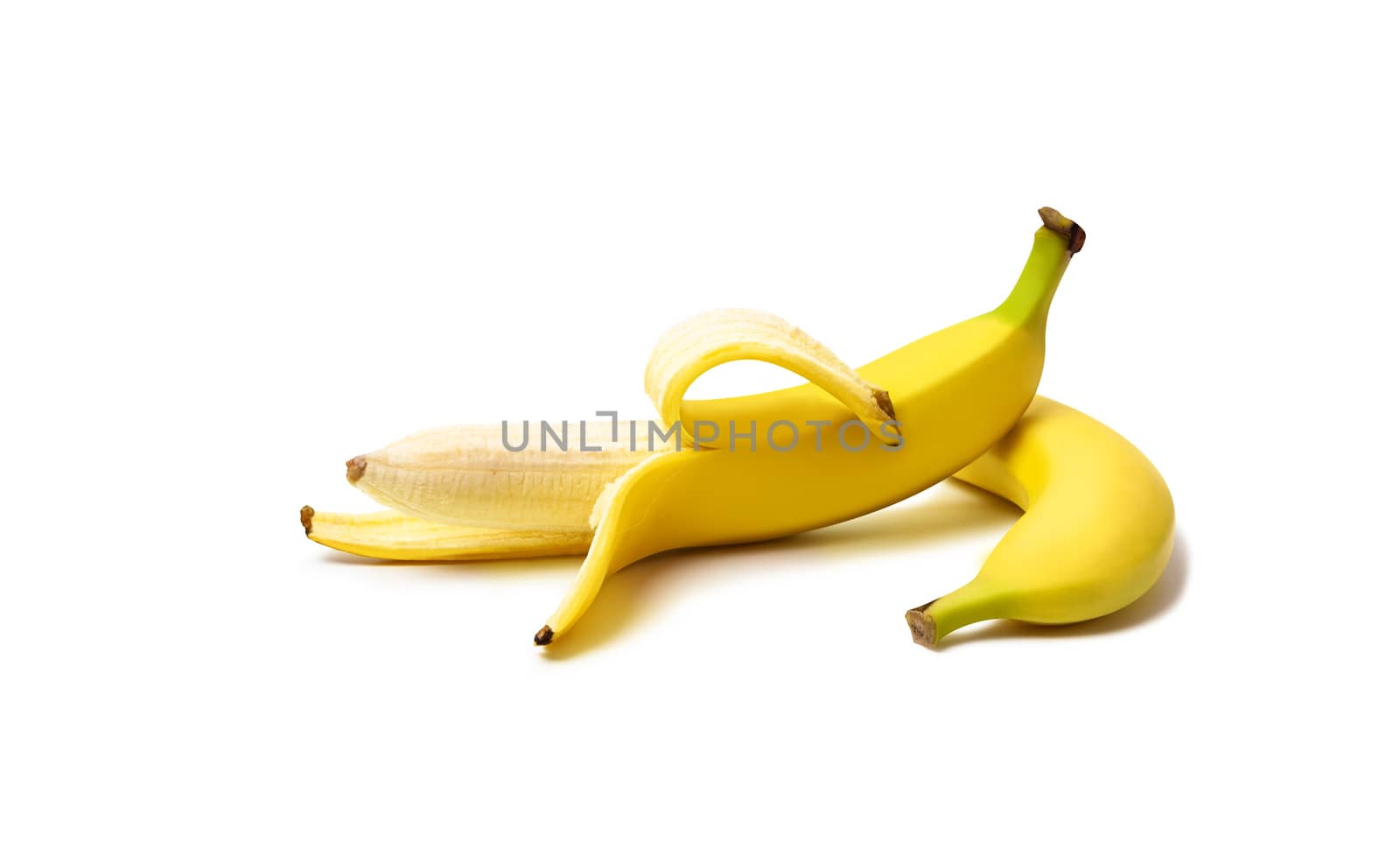 Two banana. Whole and peeled banana isolated on white background