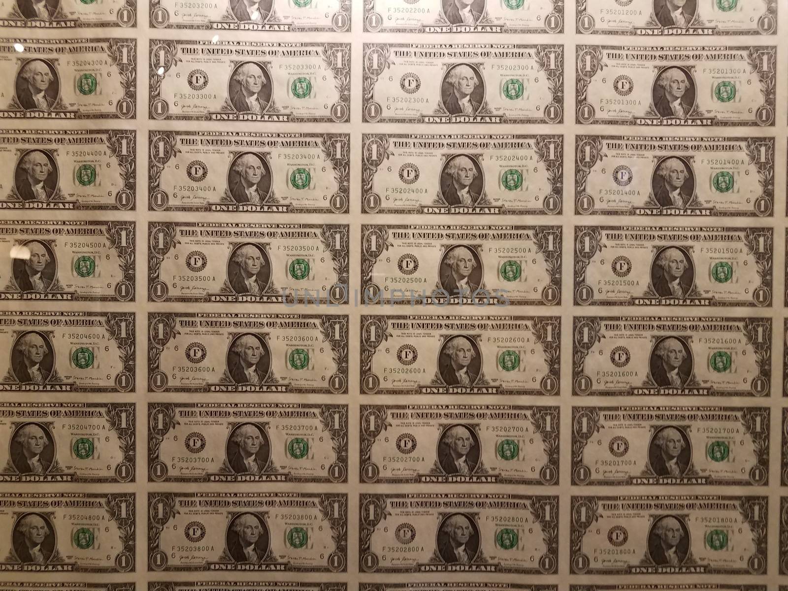 paper sheet of one dollar United States bills or notes