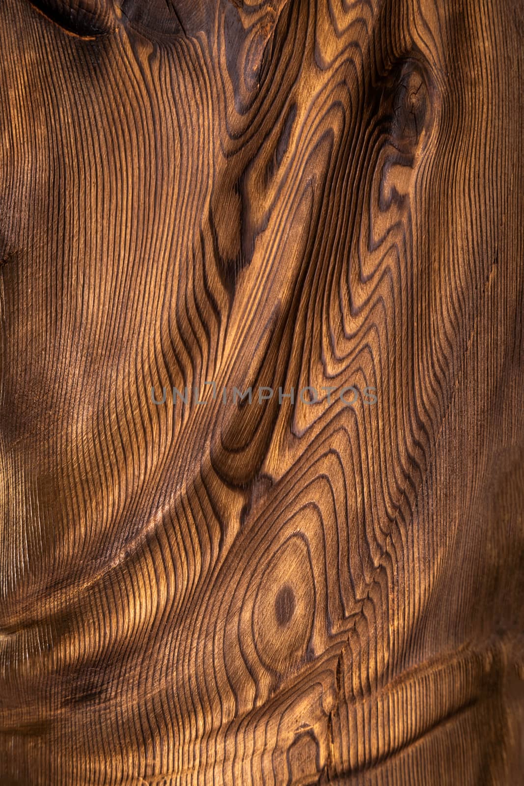 Brown wavy wooden surface. by sveter