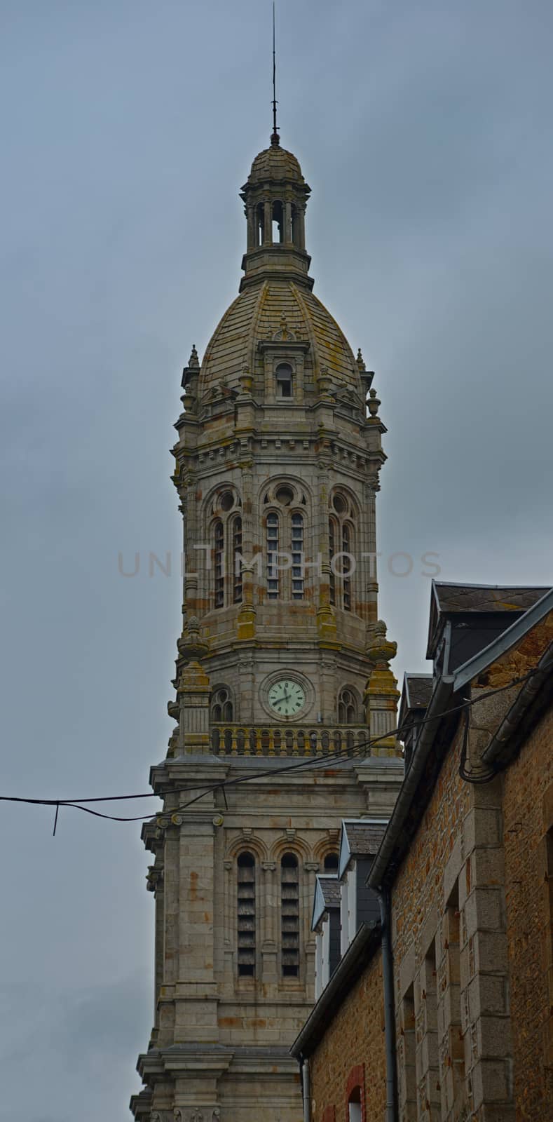 Medieval tall clock tower made out of stone in Avranches, France by sheriffkule