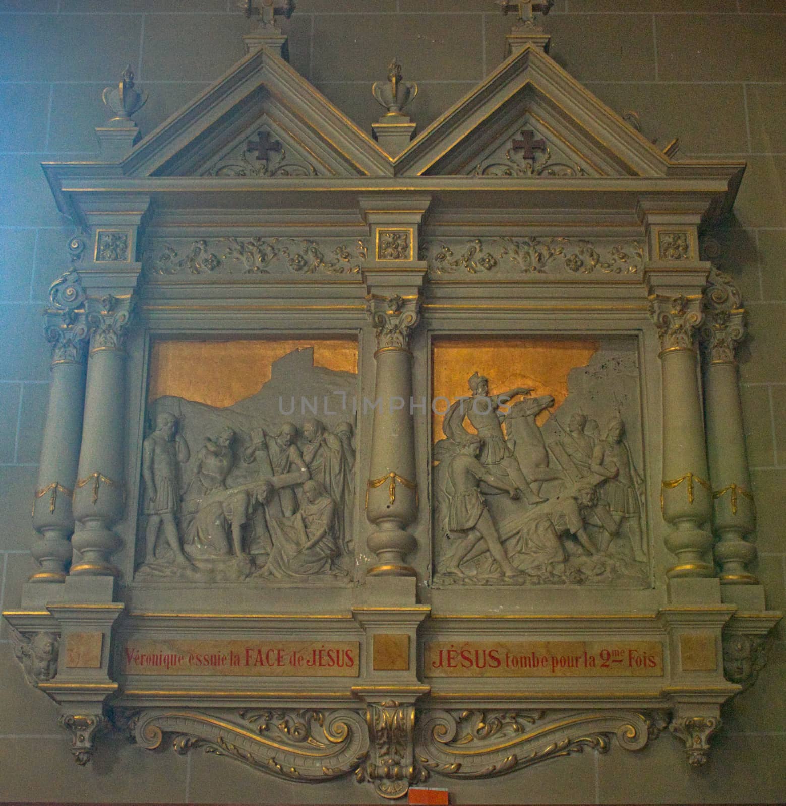 Altar with statues of saints in Catholic cathedral at Avranches, France