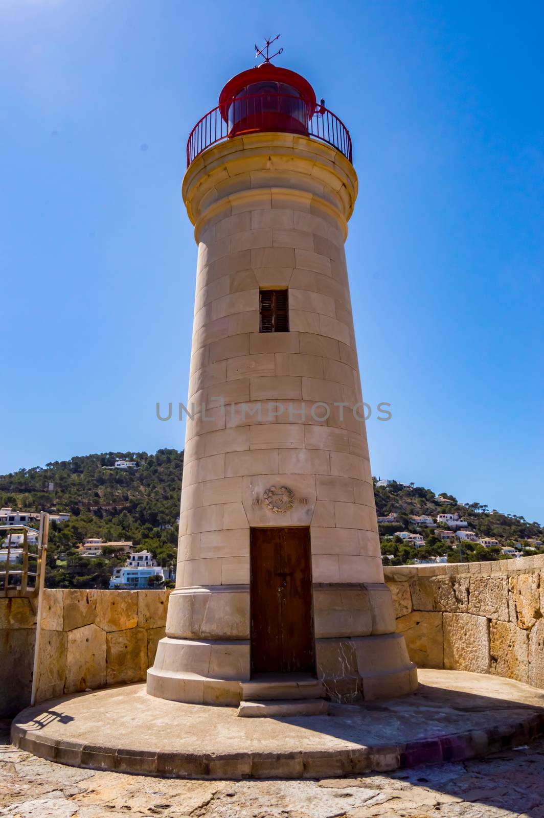 close-up of the lighthouse of the city of andratx north west of the island of palma de mallorca in Spain
