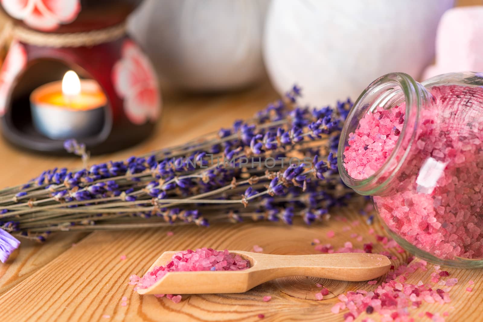 sea salt in a wooden spoon with natural lavender oil and a bunch by kosmsos111