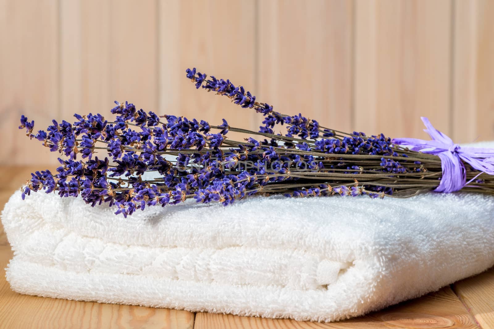 bunch of dry lavender on a white terry towel close up