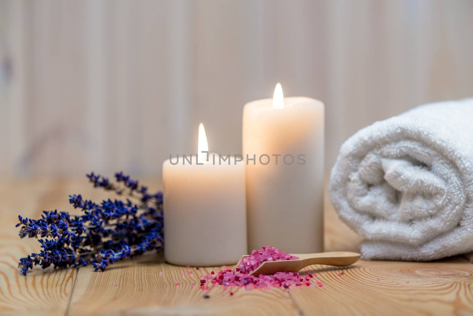 lavender, burning candles and sea salt for spa treatment and relaxation objects close up