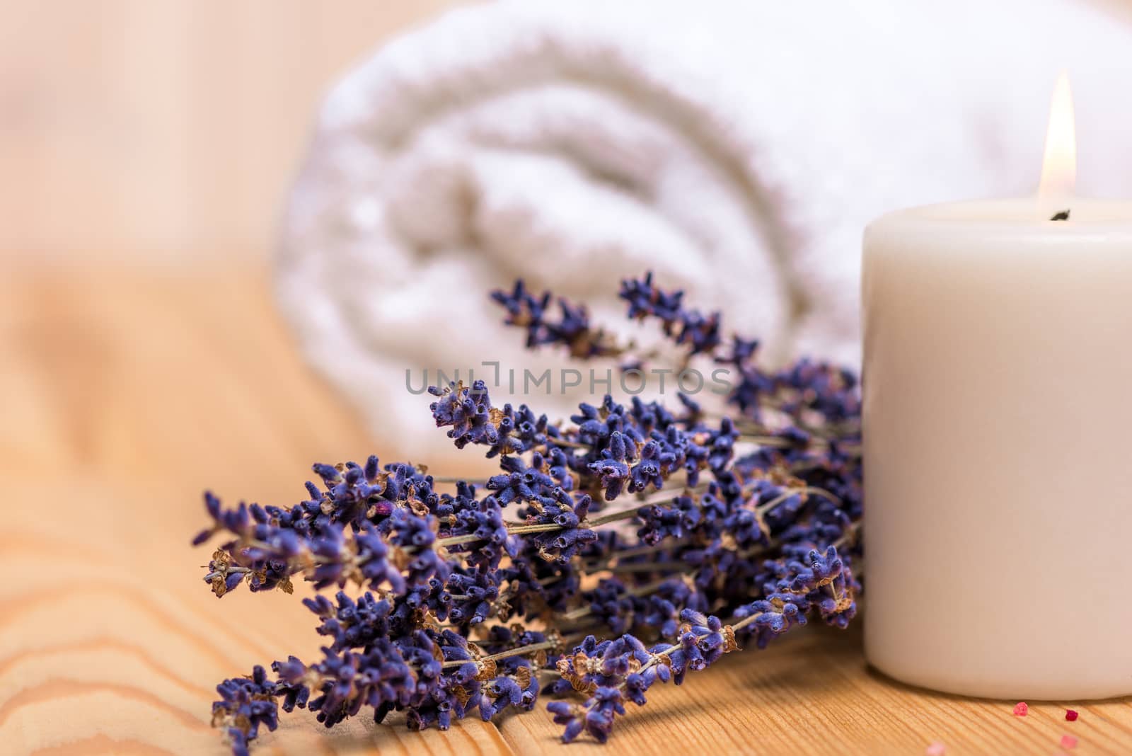 macro shot of dried lavender and burning candle by kosmsos111