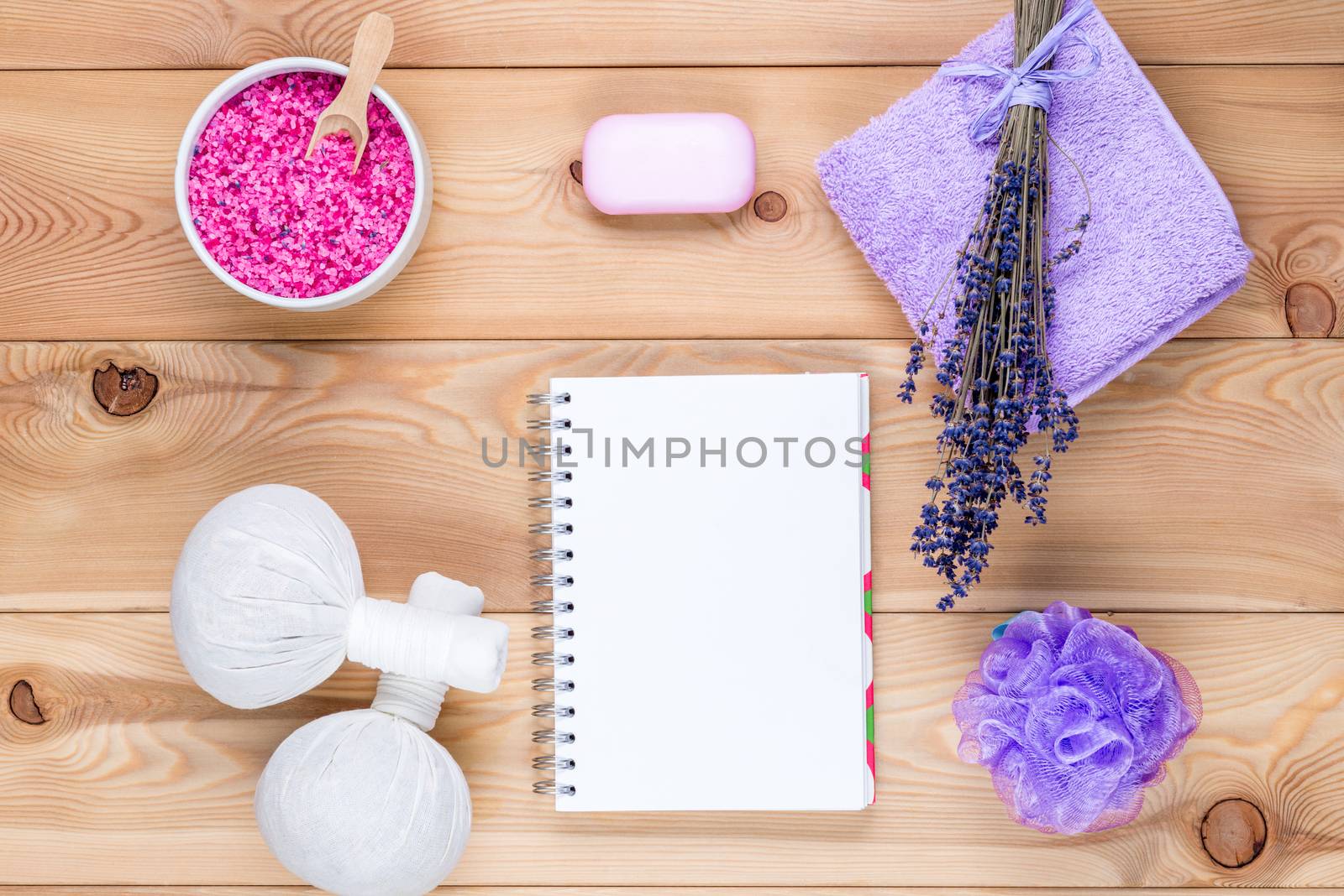 lavender theme: a clean sheet of notepad and objects with lavender for spa and relaxation