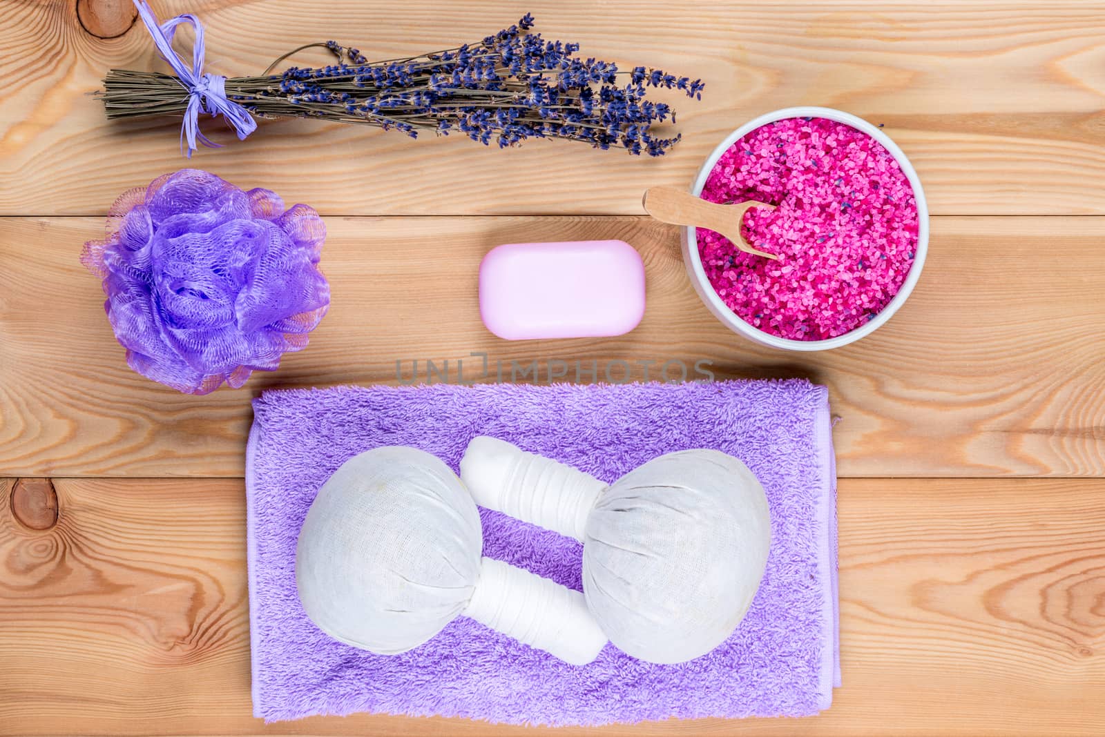 top view herbal bags with natural lavender for massage, sea salt for relaxation and massage and spa