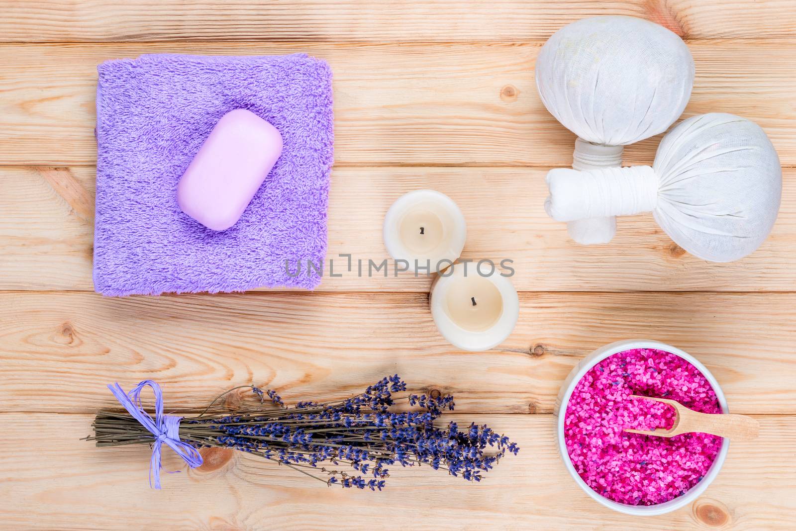 lavender, candles and herbal massage bags top view objects for spa treatment
