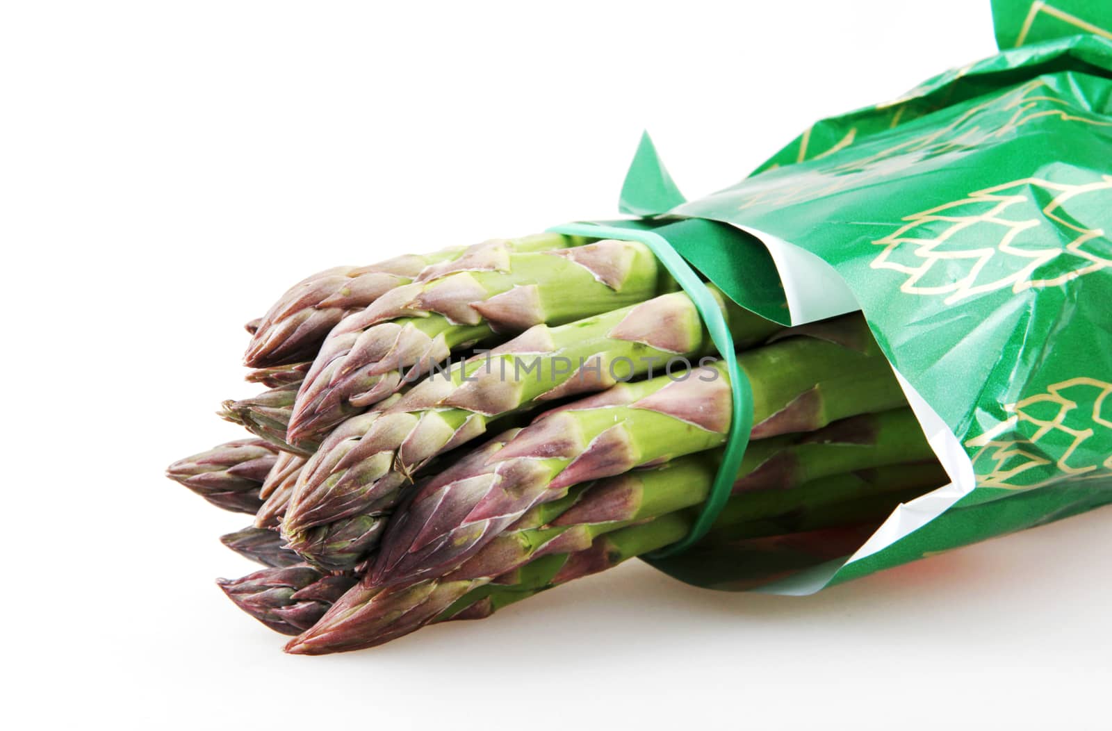Close-Up Of Asparaguses Against White Background by nenovbrothers