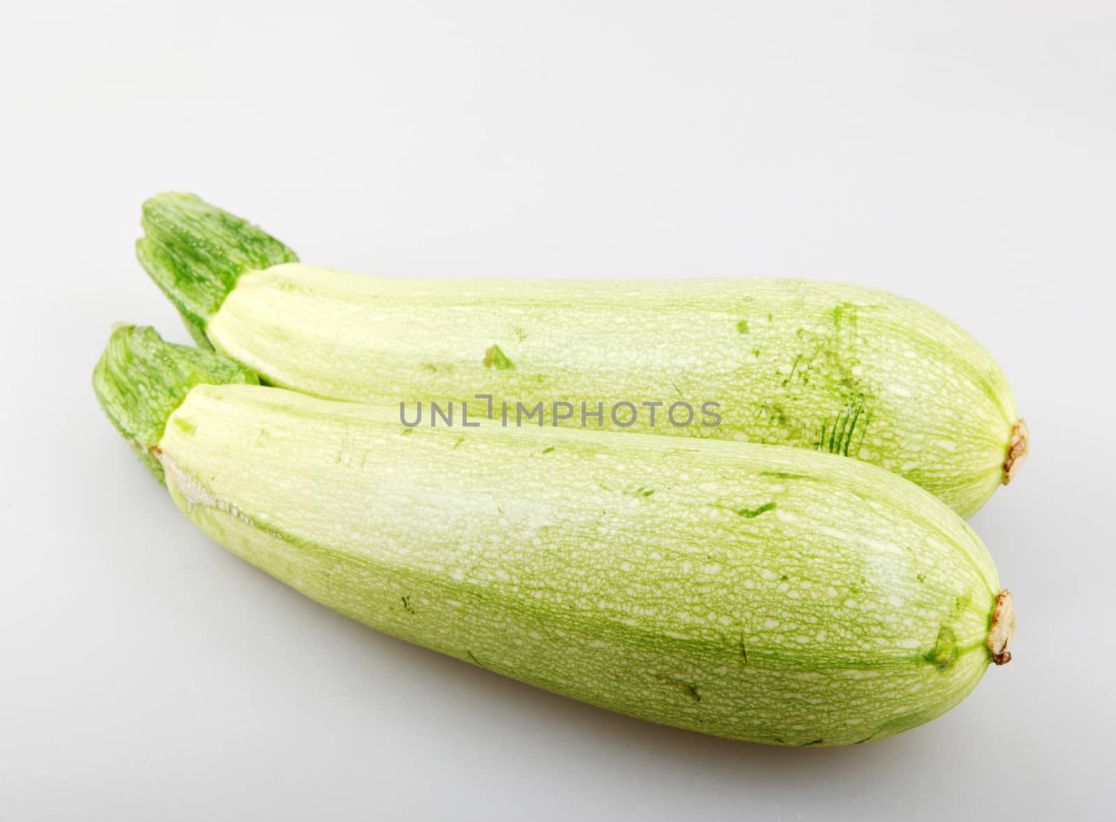 Fresh Vegetable Zucchini Against White Background