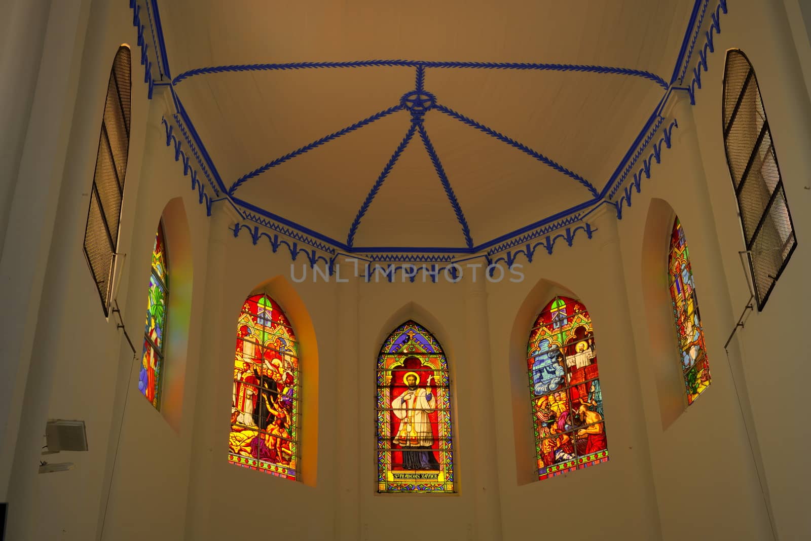 roof and stained glasses of choir of church Saint Francis Xavier in Melaka Malaysia  modeled after Cathedral of Saint Peter in Montpellier France