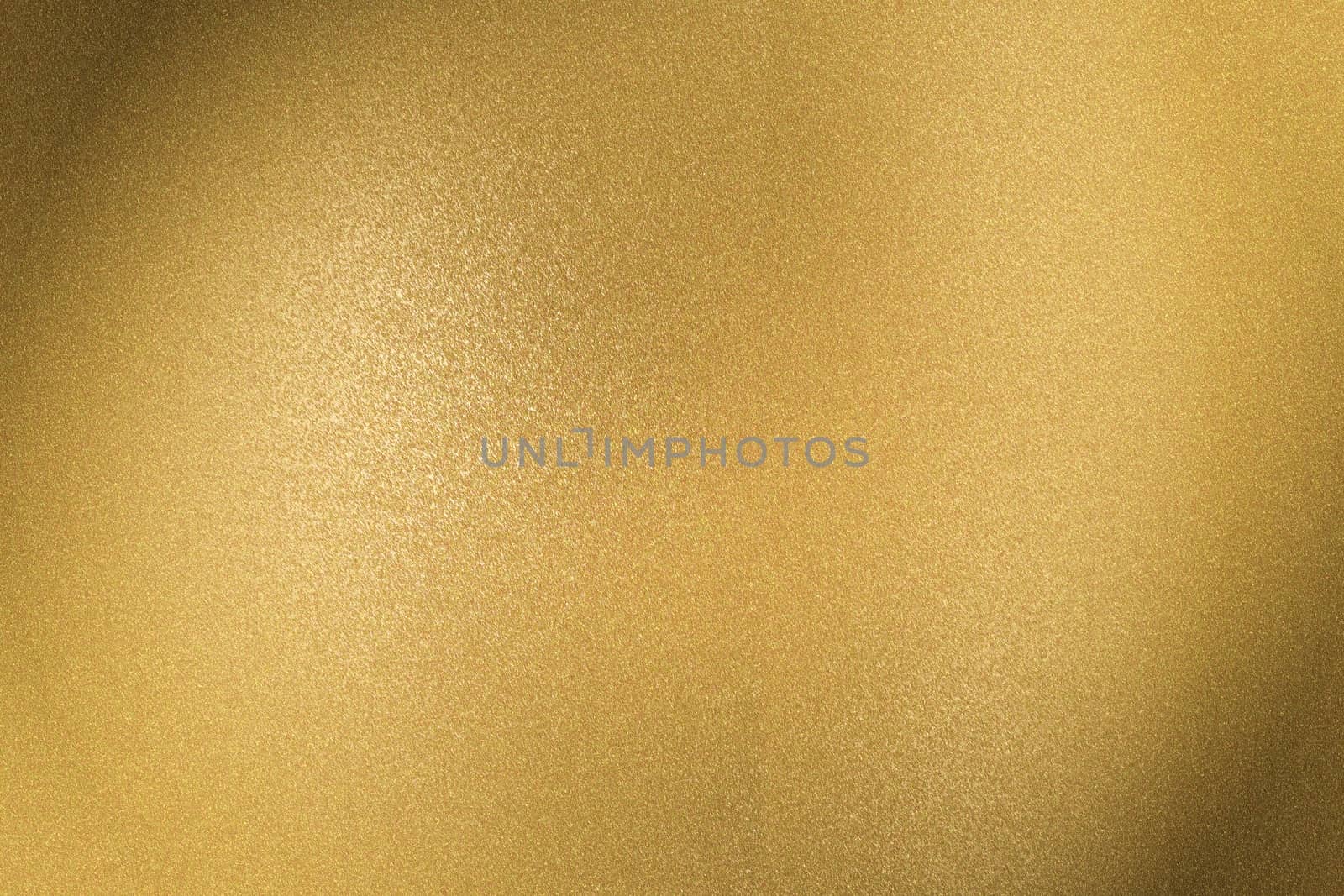 Brushed golden metal sheet surface, abstract texture background