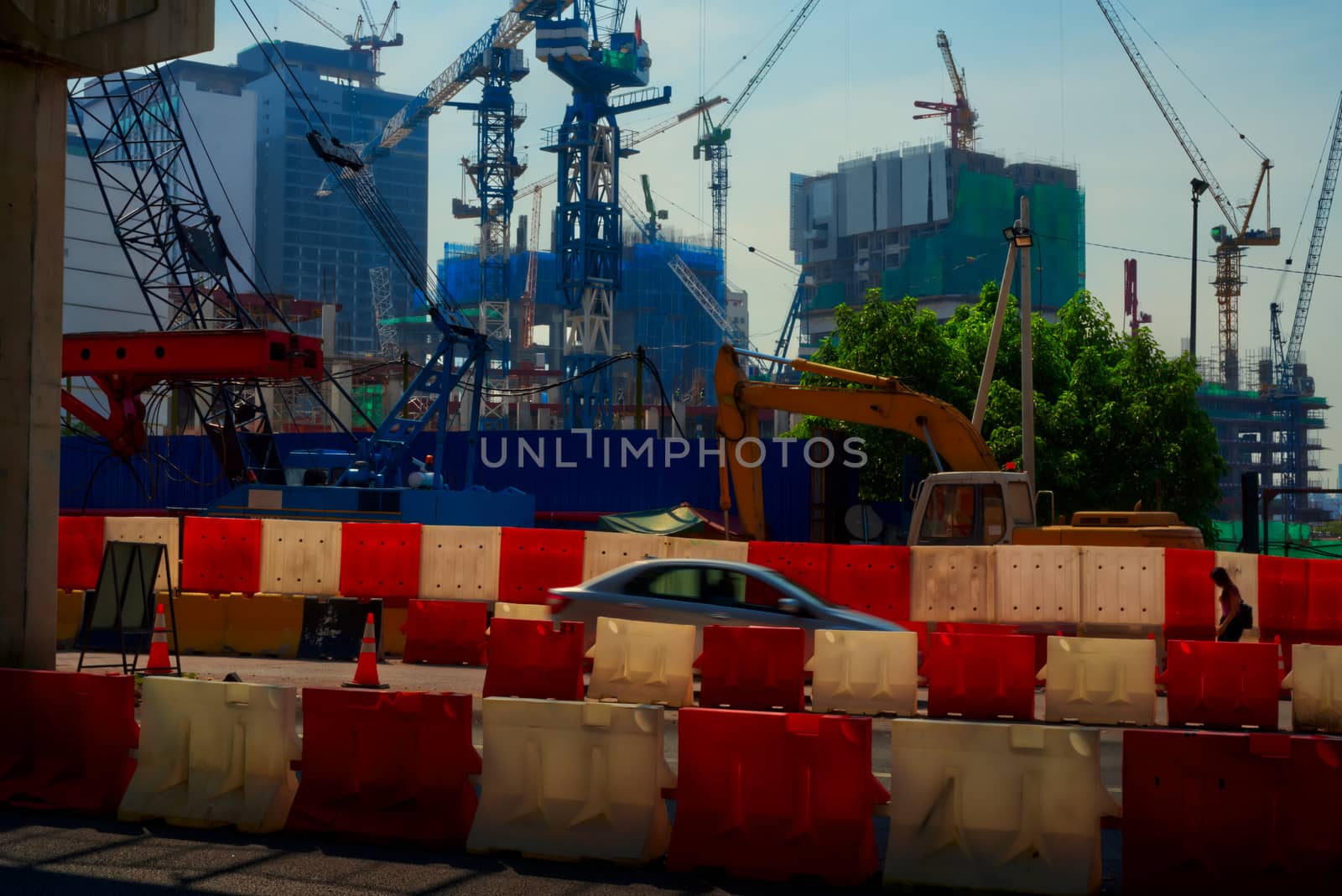 colorful construction site with many cranes in Kuala Lumpur Malaysia