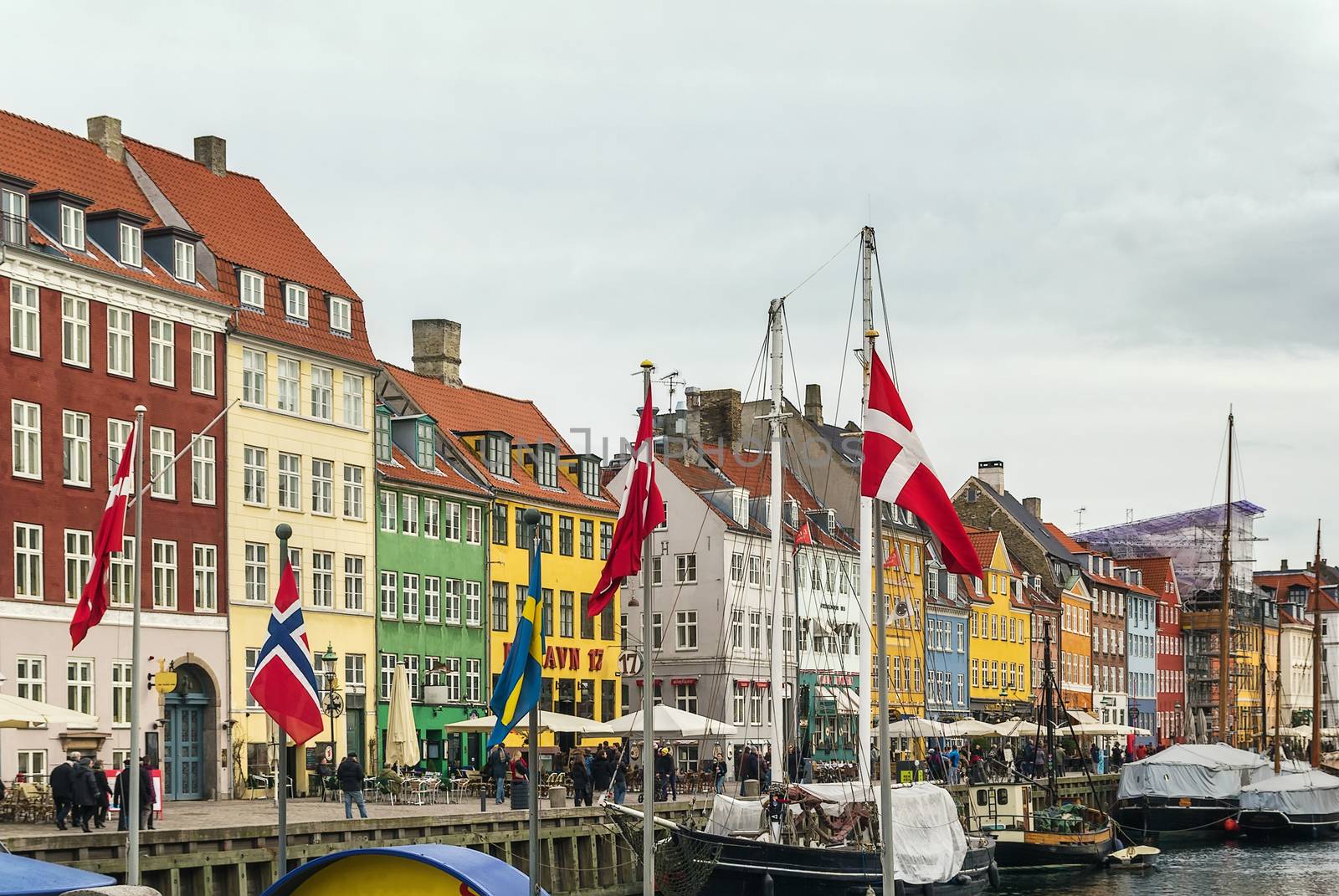 Nyhavn is a 17th-century waterfront, canal and entertainment district in Copenhagen, Denmark.