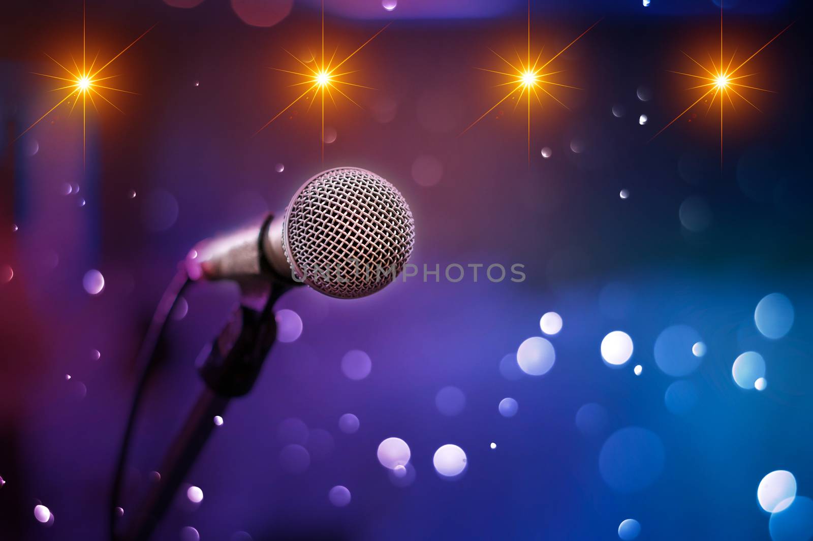 communication microphone on stage against a background of auditorium Concert stage by sarayut_thaneerat