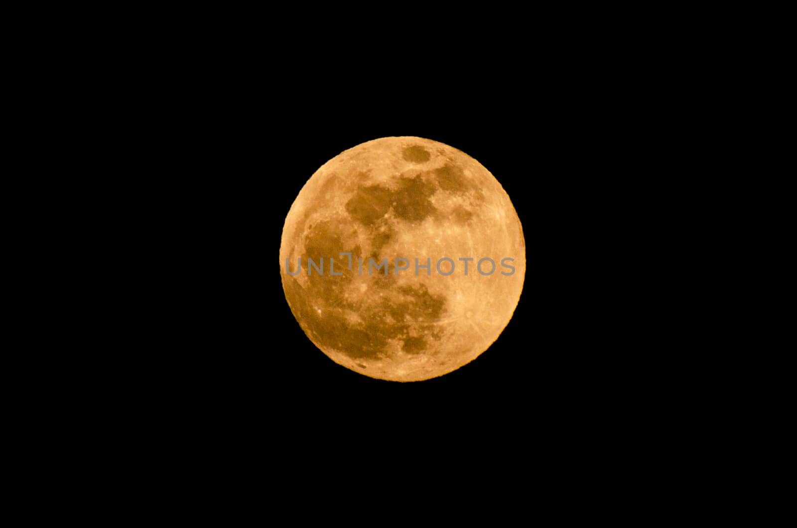The yellow full moon on black background by sarayut_thaneerat