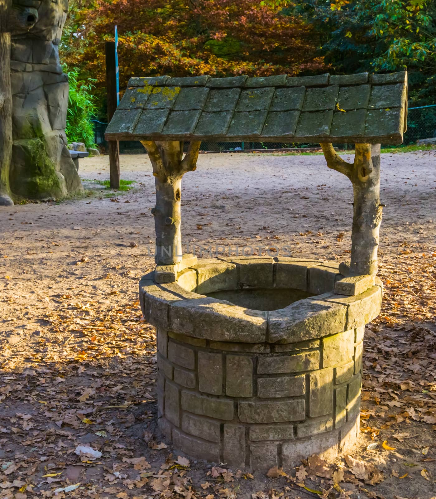 classical water well, medieval looking architecture, historical decorations