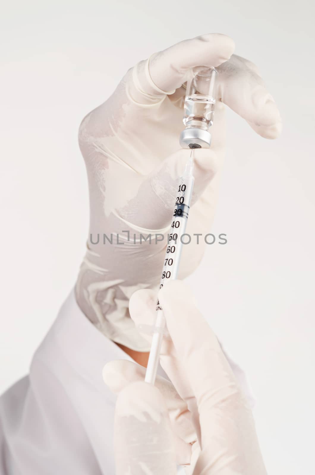 Close up injecting vaccination medicine on man doctor, medical concept.