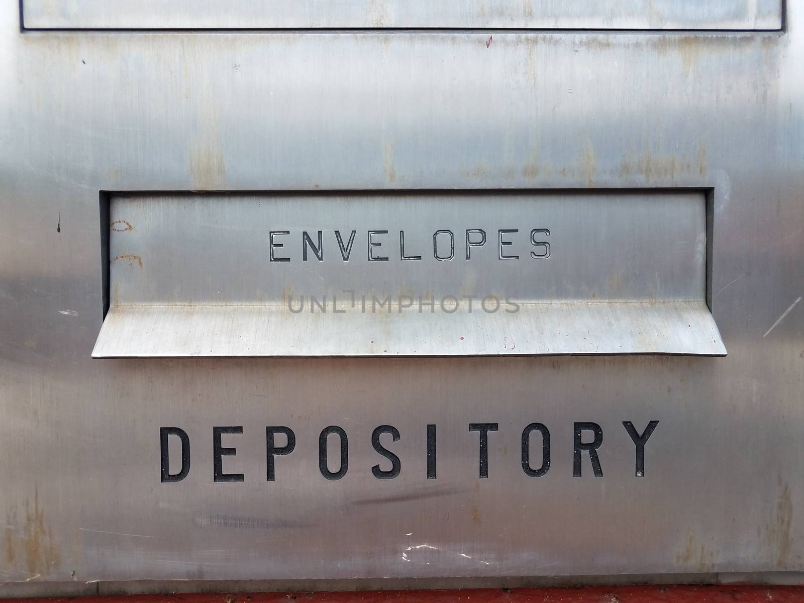 depository and envelopes sign on silver metal box by stockphotofan1