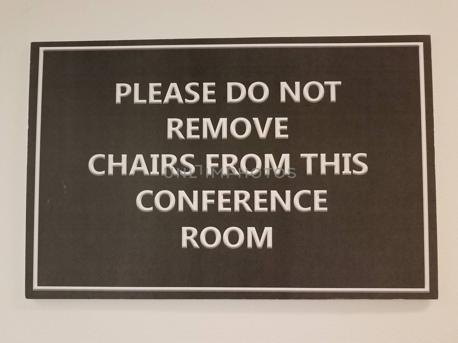 black please do not remove chairs from this conference room sign by stockphotofan1