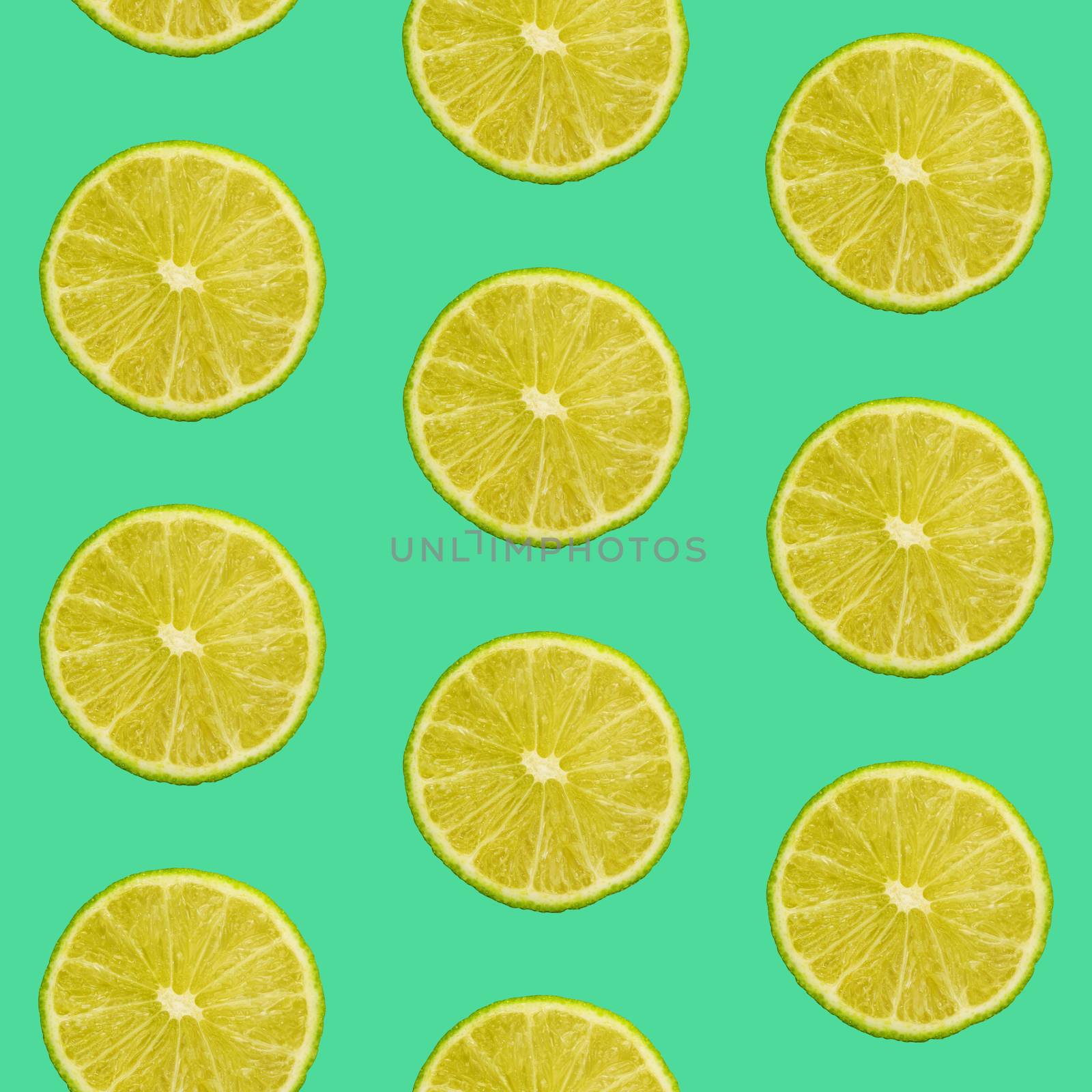 Seamless pattern of limes on green background by BreakingTheWalls