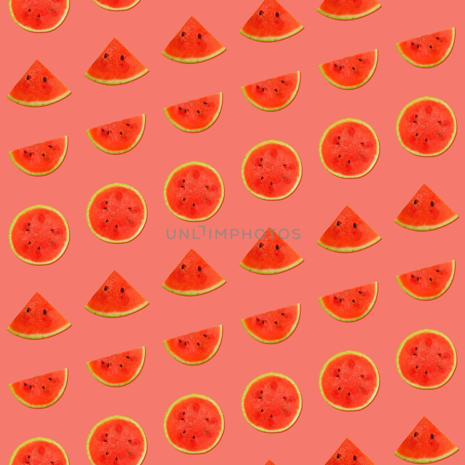 Seamless pattern of fresh red ripe juicy watermelon round cut wedges on vivid coral pink background